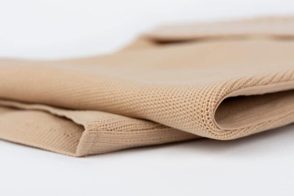 Close up of flat knit Graduated Compression Garments for leg lymphedema, edema and lipedema – powerful compression stocking for greater edema containment Latest News About the Lymphedema Treatment Act Implementation and Medicare